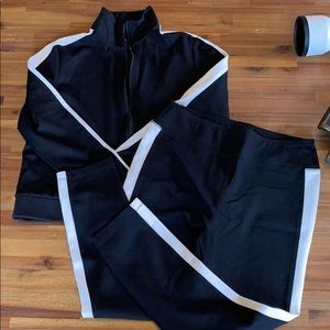 Black and white tracksuit.